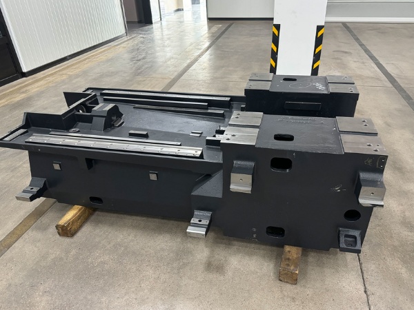 The frame and base of a CNC machine are the primary load-bearing components